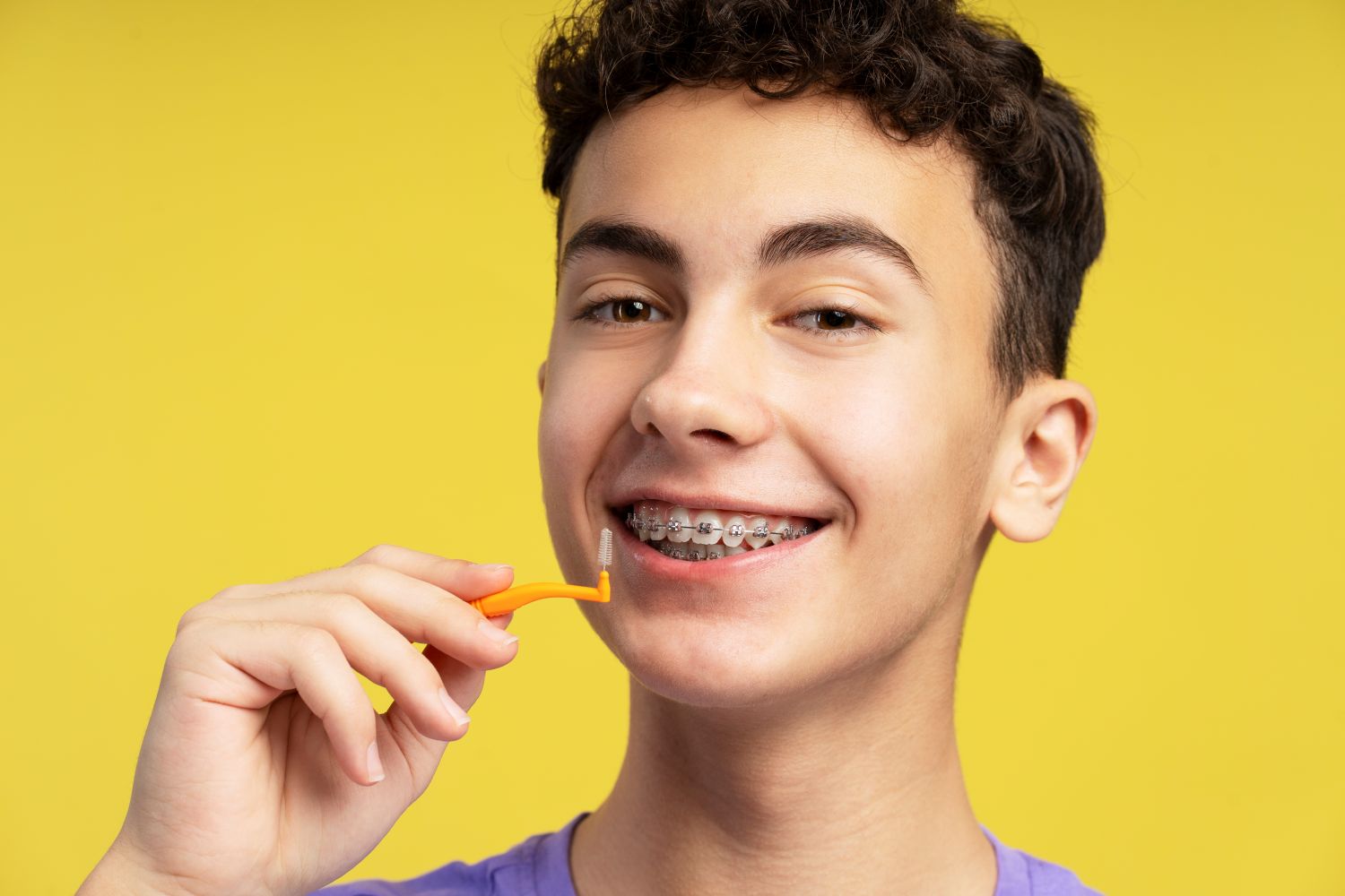 What types of food should be avoided when wearing braces